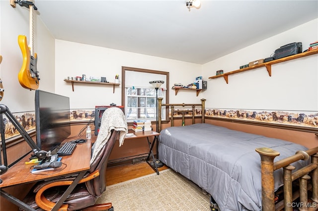 bedroom with light hardwood / wood-style floors