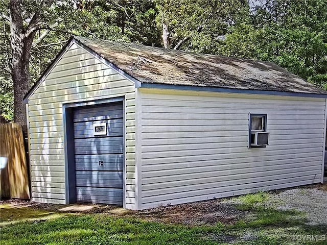 view of outbuilding with a garage