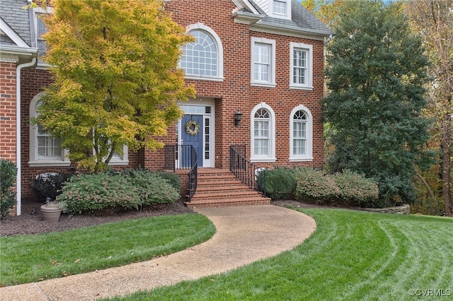 view of front of house with a front lawn