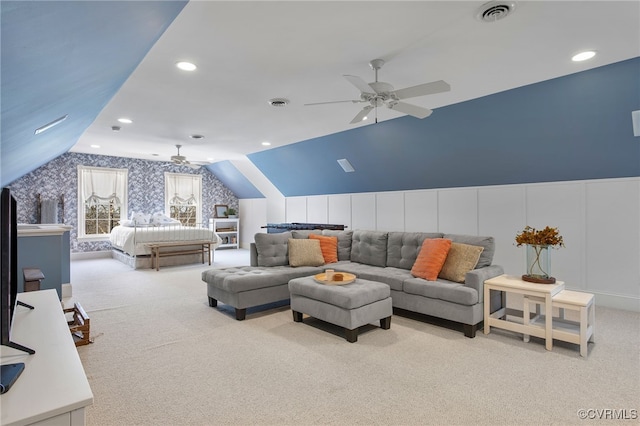 bedroom with vaulted ceiling and light colored carpet