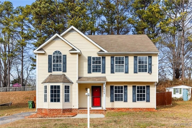 view of front of property with a front lawn