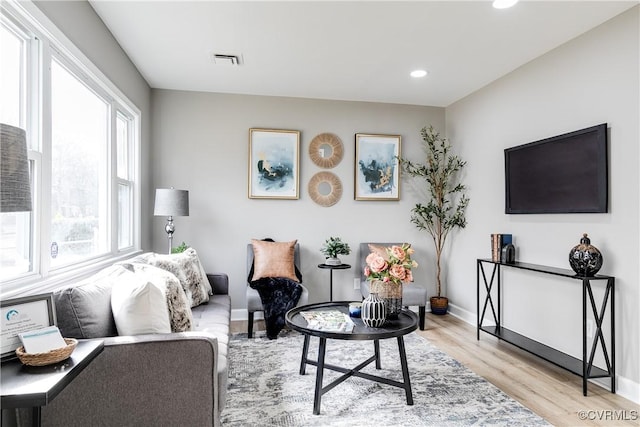 living room with light wood-type flooring