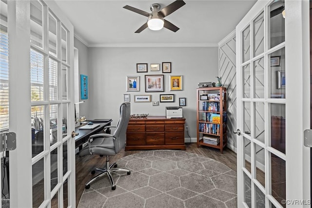 office space featuring french doors, ornamental molding, dark wood-type flooring, ceiling fan, and baseboards