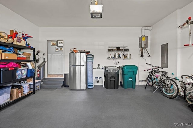 garage with electric panel, a garage door opener, freestanding refrigerator, water heater, and a sink