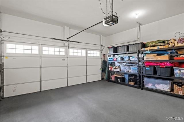 garage featuring a garage door opener