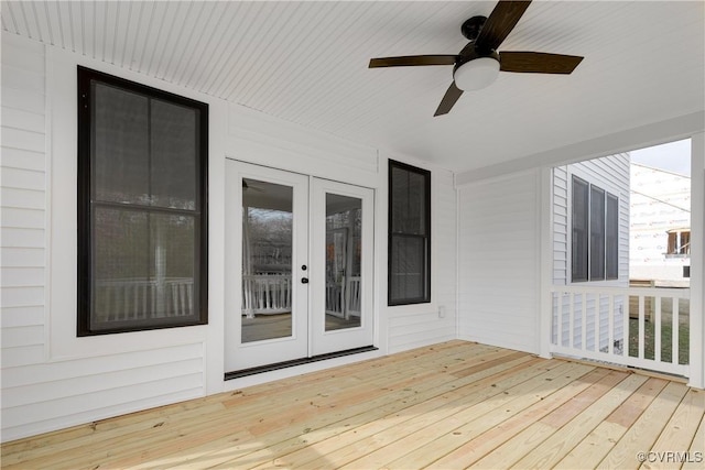 deck with ceiling fan and french doors