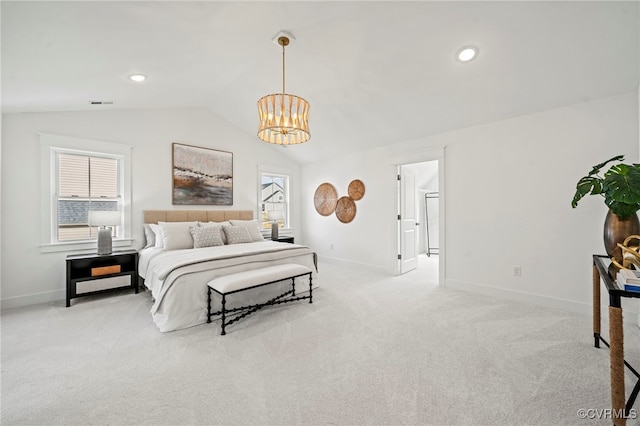 carpeted bedroom featuring lofted ceiling and a chandelier