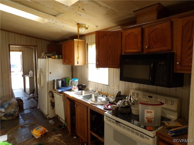 kitchen with lofted ceiling, sink, wood walls, range, and white refrigerator