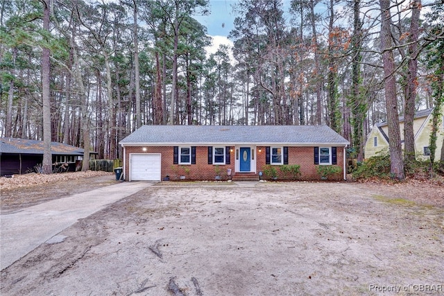 ranch-style home with a garage