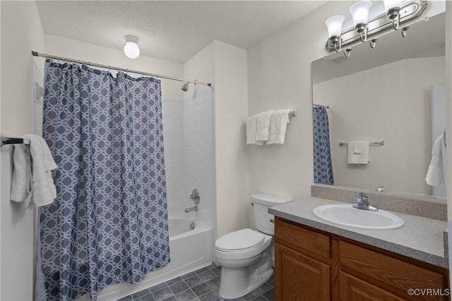 full bathroom featuring vanity, shower / tub combo, a textured ceiling, and toilet