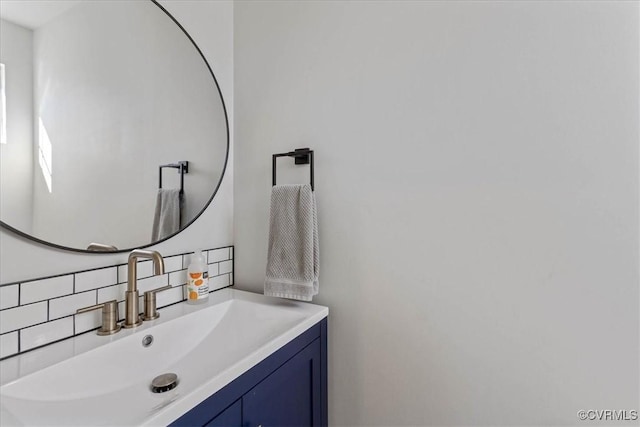 bathroom featuring backsplash and vanity