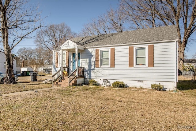 bungalow-style home featuring a front lawn