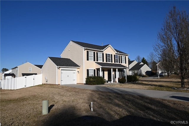 view of front facade featuring a garage and a front lawn