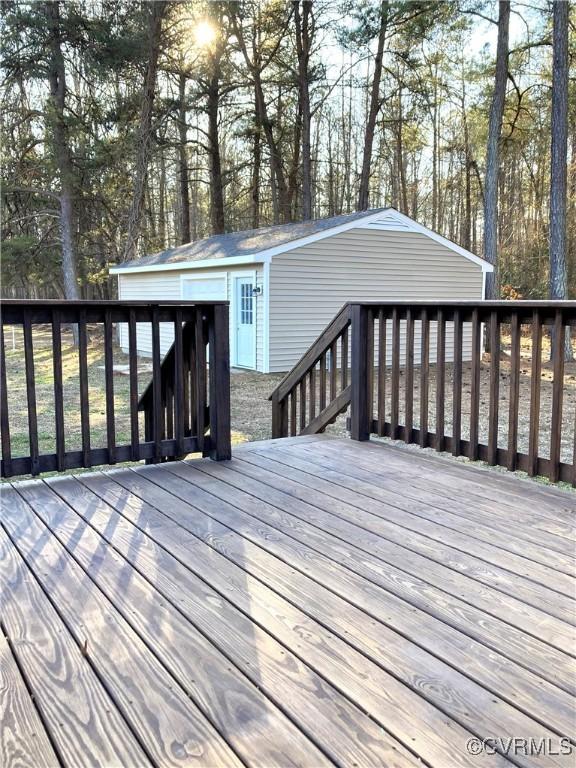 deck featuring an outbuilding