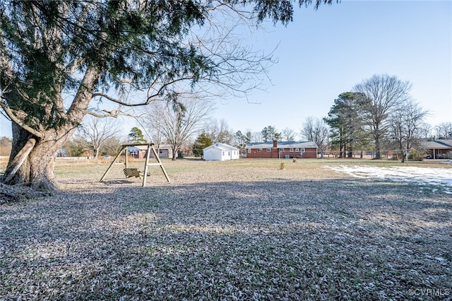 view of yard with a playground