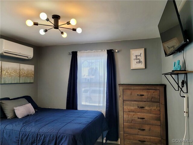 bedroom featuring a wall mounted air conditioner