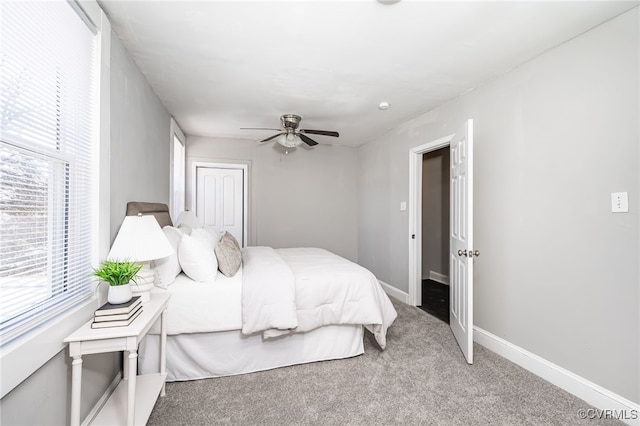 bedroom featuring ceiling fan and carpet flooring