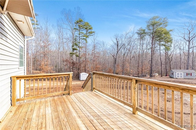 wooden deck featuring a shed