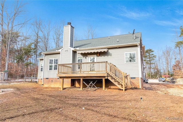 rear view of house with a deck