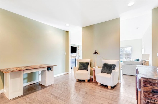 sitting room featuring light wood-type flooring