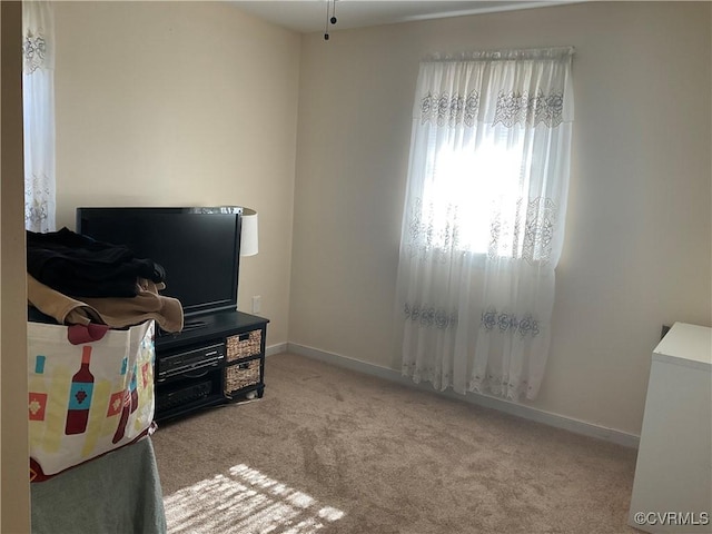 interior space featuring light colored carpet