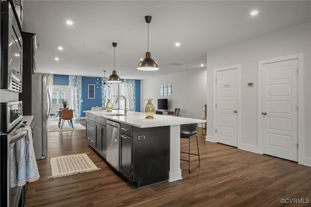 2616 Lassen Walk Unit B, Henrico, VA 23294 - kitchen featuring a sink, stainless steel appliances, a kitchen island with sink, dark wood-type flooring, and light countertops
