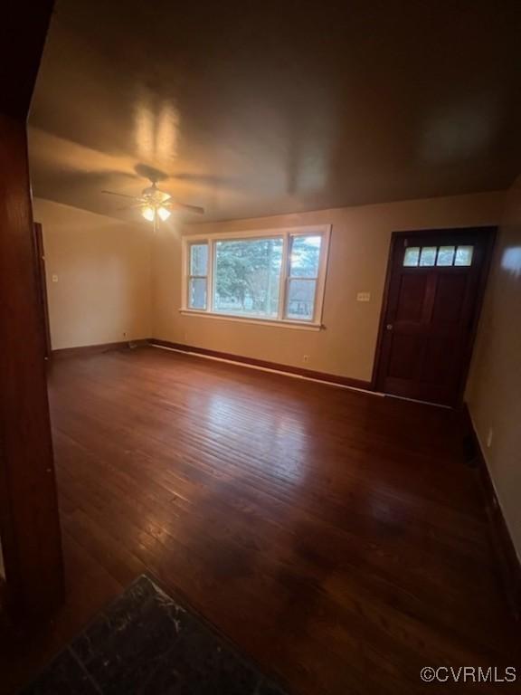 entrance foyer featuring dark hardwood / wood-style floors