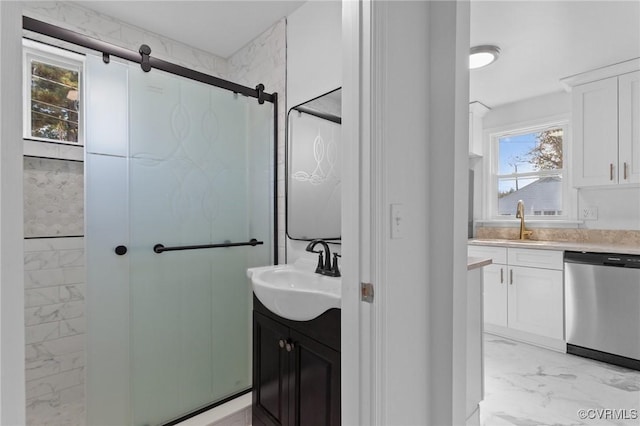 bathroom featuring vanity and a shower with shower door