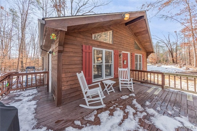 view of snow covered deck