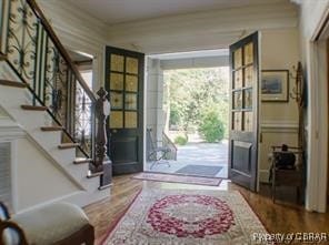 foyer with hardwood / wood-style floors