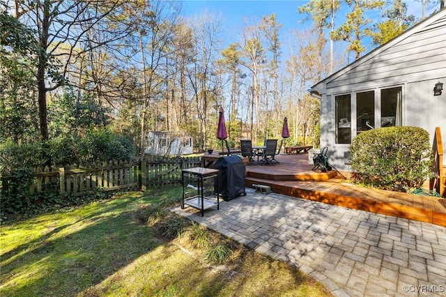 view of yard with a patio and a deck