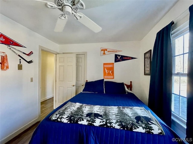 unfurnished bedroom featuring ceiling fan and wood-type flooring