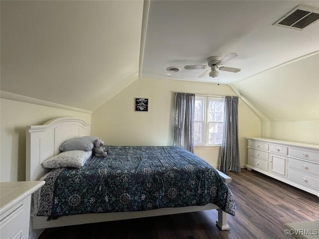 bedroom with lofted ceiling, dark hardwood / wood-style flooring, and ceiling fan