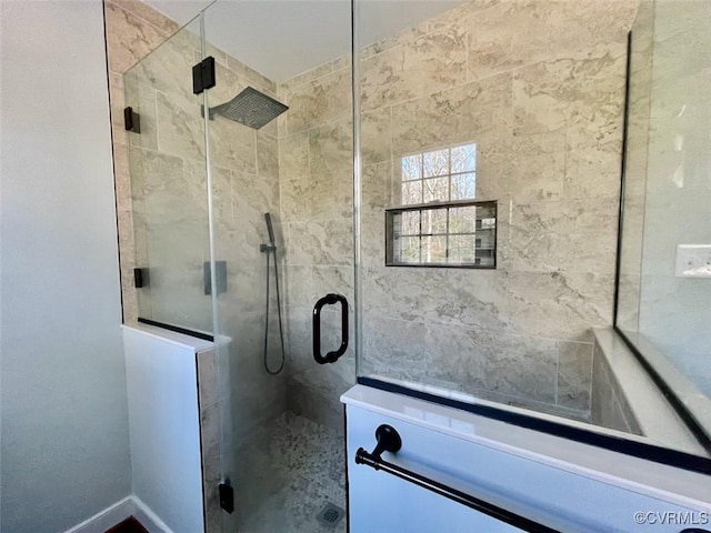 bathroom featuring an enclosed shower