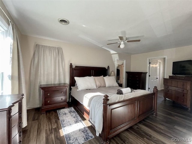 bedroom featuring ceiling fan and dark hardwood / wood-style flooring