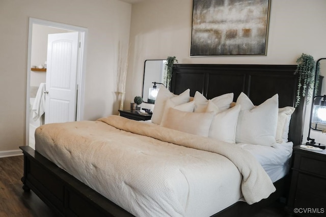 bedroom featuring dark hardwood / wood-style floors