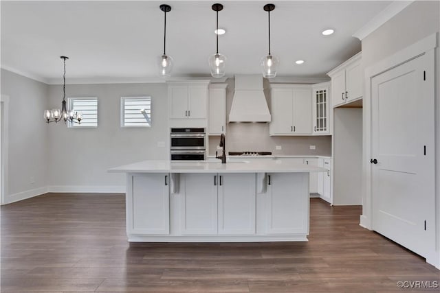 8900 Freebridge Rd, Chesterfield, VA 23832 - kitchen featuring custom range hood, light countertops, a chandelier, white cabinets, and ornamental molding