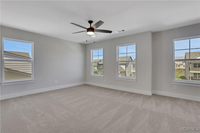 8900 Freebridge Rd, Chesterfield, VA 23832 - empty room featuring plenty of natural light, carpet floors, baseboards, and ceiling fan