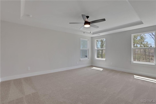 8900 Freebridge Rd, Chesterfield, VA 23832 - spare room featuring a tray ceiling, baseboards, carpet floors, and a ceiling fan