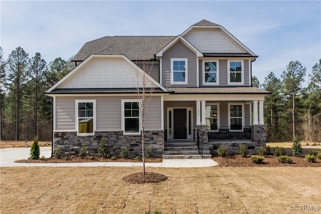 8900 Freebridge Pl, Chesterfield, VA 23832 - craftsman house with a porch, roof with shingles, and stone siding