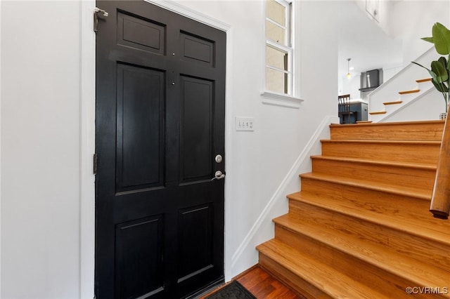 foyer with wood-type flooring