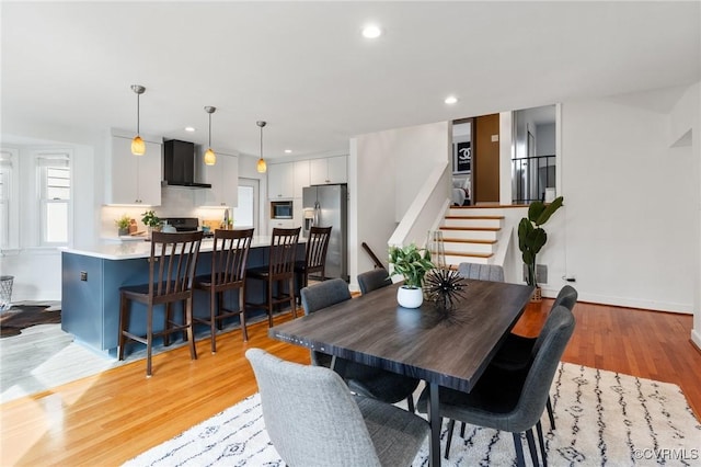 dining room with light wood-type flooring