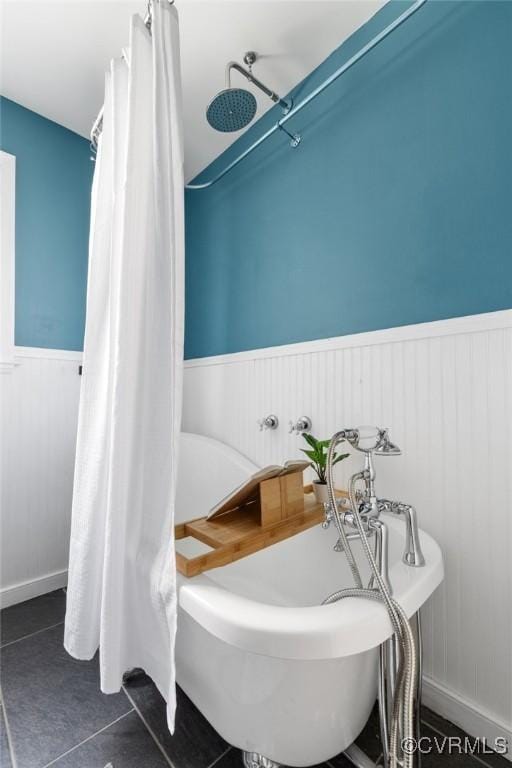 bathroom with tile patterned flooring