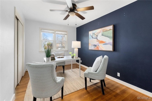 office area featuring hardwood / wood-style floors and ceiling fan