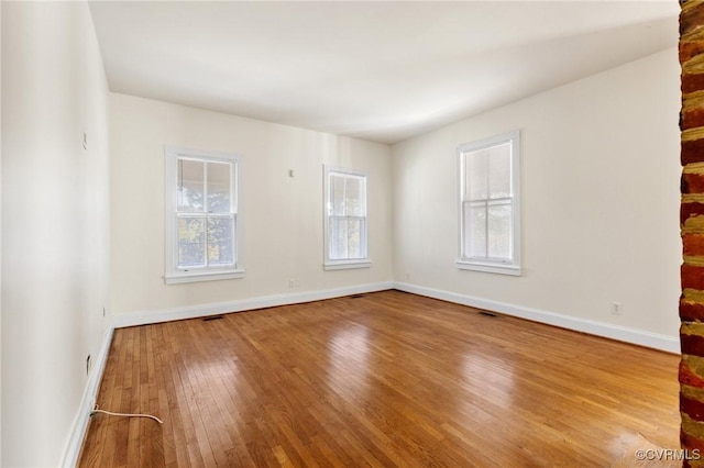 empty room featuring light hardwood / wood-style floors