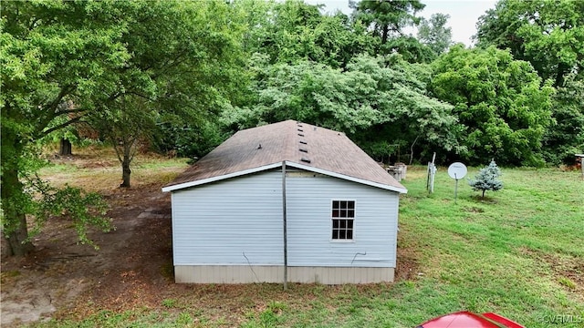 view of property exterior with a yard