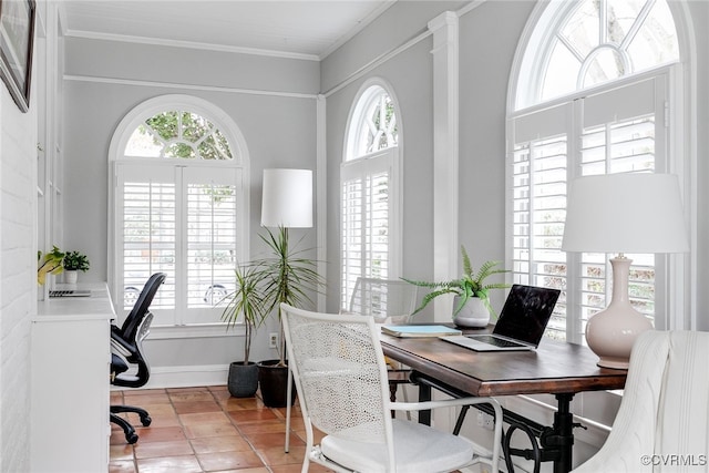 tiled home office with crown molding and decorative columns