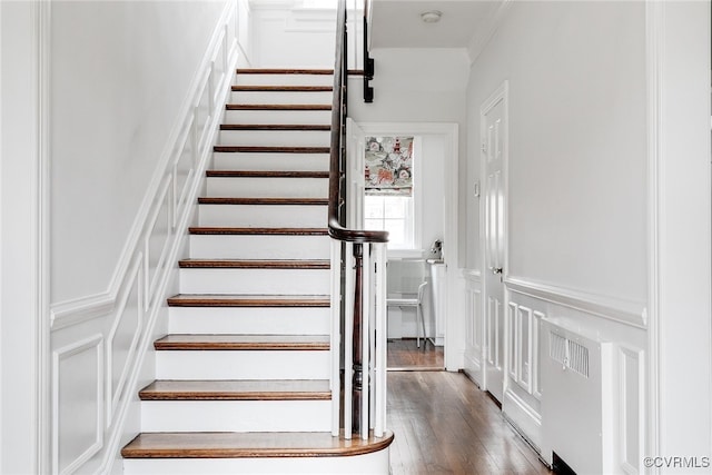 stairway with wood-type flooring