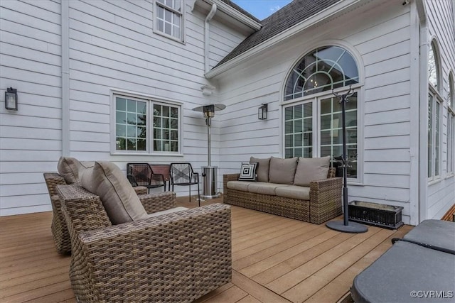 deck featuring outdoor lounge area