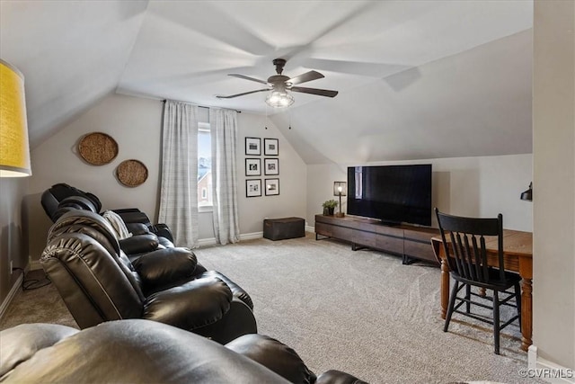 carpeted living room featuring ceiling fan and lofted ceiling